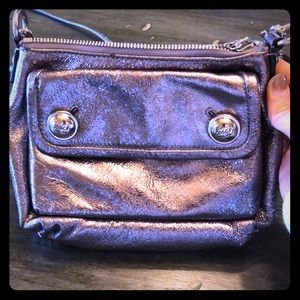 Shiny Silver COACH crossbody. Good condition